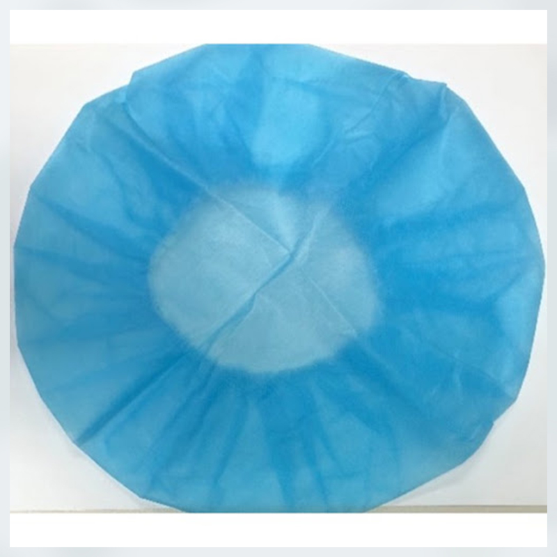 Disposable non-woven round cap blue
